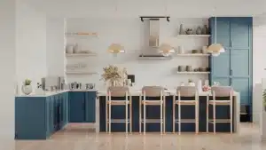 Modern kitchen remodel with blue shaker cabinets, white walls, floating shelves, and waterfall island countertop