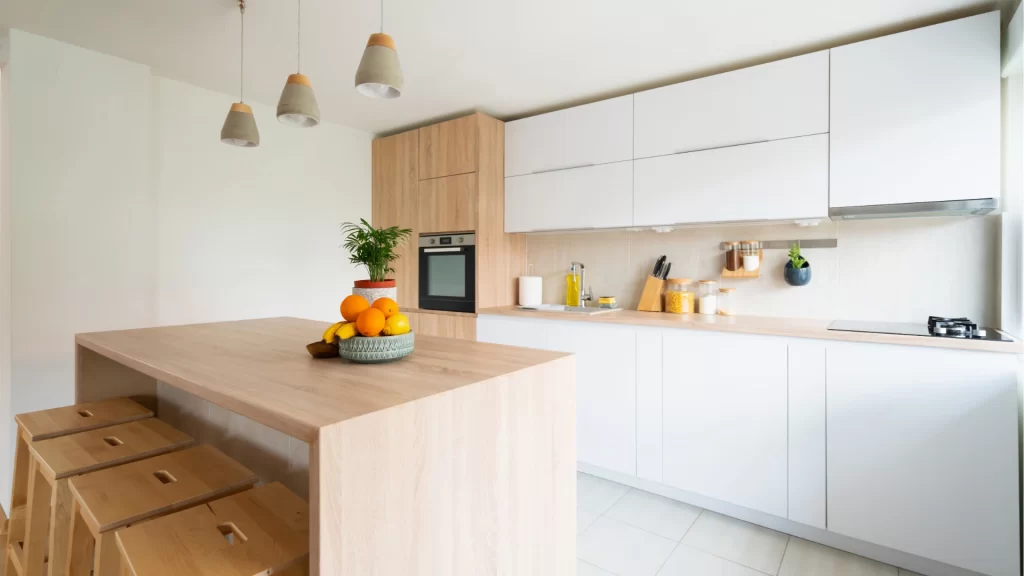 Custom white and light wood kitchen cabinetry