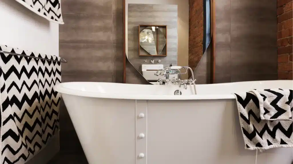 Freestanding tub with soapstone wall tile