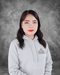 Pottstown Construction Company team member in light gray hoodie against textured gray background